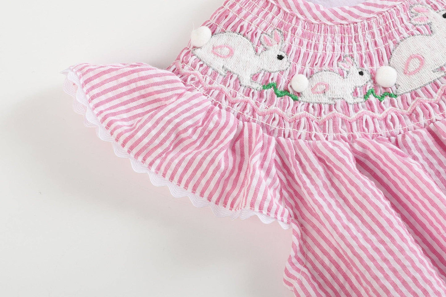 Pink Seersucker Running Bunnies Smocked Flutter Romper: 2T